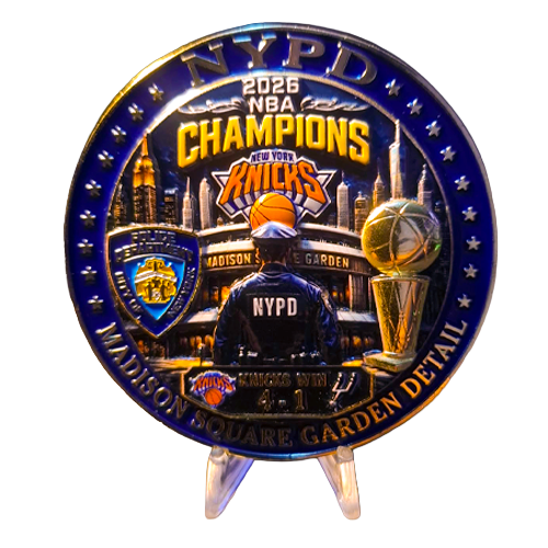 NYPD Madison Square Garden collectible — gold coin on stand Gold-finish NYPD and New York Knicks collectible coin displayed on a clear stand.